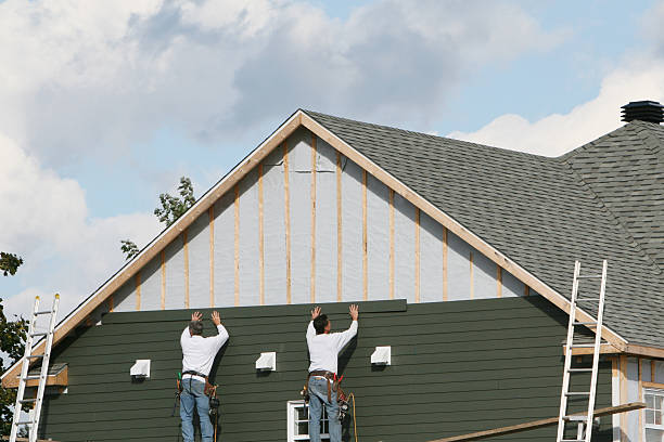 Professional Siding technician working in Wendel, PA